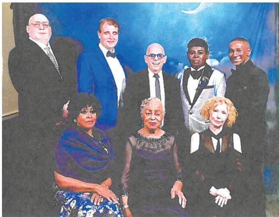 Members of the Rickenbacker family are pictured with supporters.