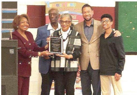 The Family of Coach Leroy M. Fair is honored.