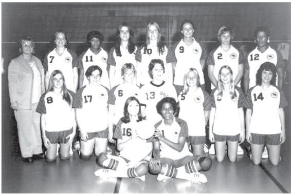 Woods (seated, on right) is pictured with her 1974- 75 USC volleyball teammates.