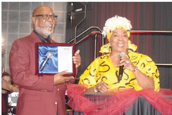 President Glover presented the Media Legacy Award to radio personality Johnny Green.