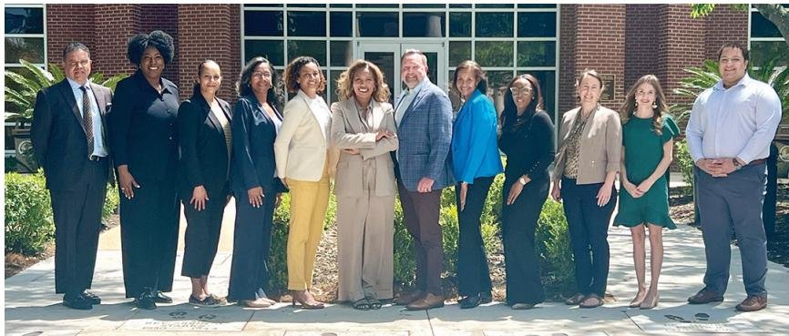 To meet a need for demanding company roles, The Ritedose Corporation partnered with InSpring and Benedict College to develop the RISE program. Members from Benedict College, Ritedose and Inspiring meet on the campus of Benedict College.