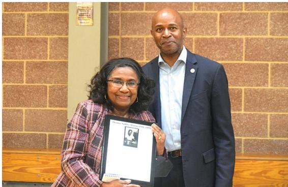 Tommye Martin McMillian (left), daughter of the late Thomas Sinkler Martin, poses for a photo with Dr. Bobby Donaldson