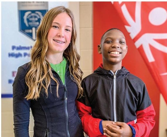 Crayton eighth-grade students Jazayah Grimes and Gray Cobia form friendship through Special Olympics Program