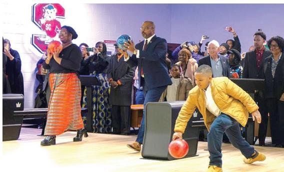 Bowling the first balls at the newly refurbished Bulldog Lanes at SC State’s Kirkland W. Green Student Center.