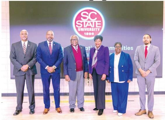 Dr. Frederick Evans, President Alexander Conyers, U.S. Rep. James E. Clyburn, Dr. Bettye Perkins, Dr. Evelyn Fields and Dr. Costanzo Bryant-Martin at the signing ceremony.