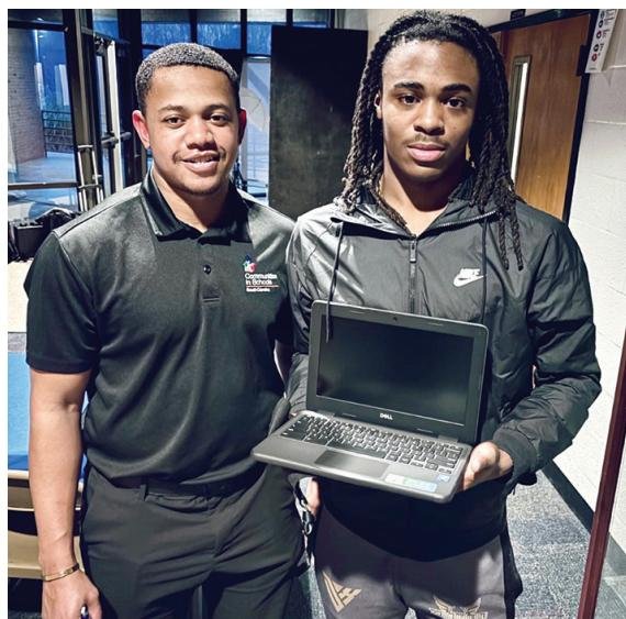 CISSC Site Coordinator at Fairfield Central High School, Shadarius Hopkins (left) with one of his students who received a laptop. More photos from the event can be provided or found on social media @cissc.