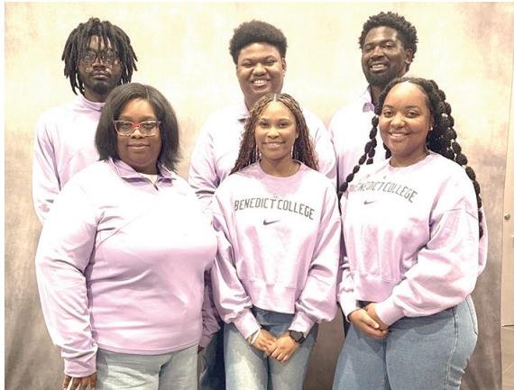 (Left to right): Dr. Kimberly Singletary, Head Coach, Trissania Lawrence, Kadine Beckford. Second row, Left to right Omario Guscott, Captain, Robert Hamilton, and Alton Moseley, Assistant Coach.