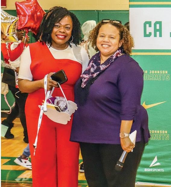 Leslie-Ann Jones, a parent and family engagement specialist at C.A. Johnson High School (left), received the APEC Aspire Award from Columbia College. Pictured with Jones is Dr. Marla Sanders, the director of Columbia College’s APEC program (right).