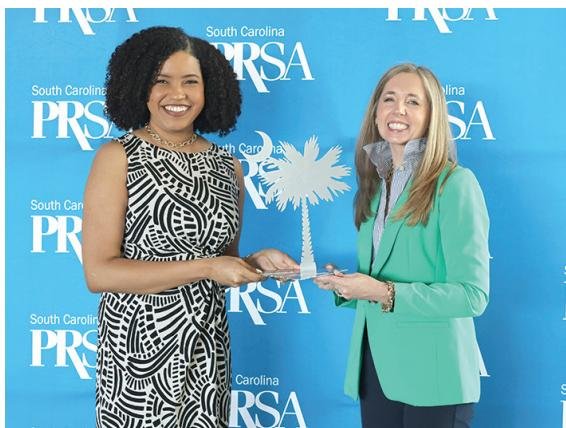 Chelsea Bennett receives award from Meredith Houck, SCPRSA Chapter President