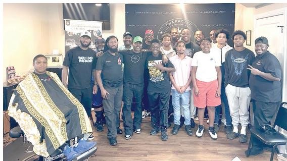 Students will receive free haircuts and mentoring at The Barbershop