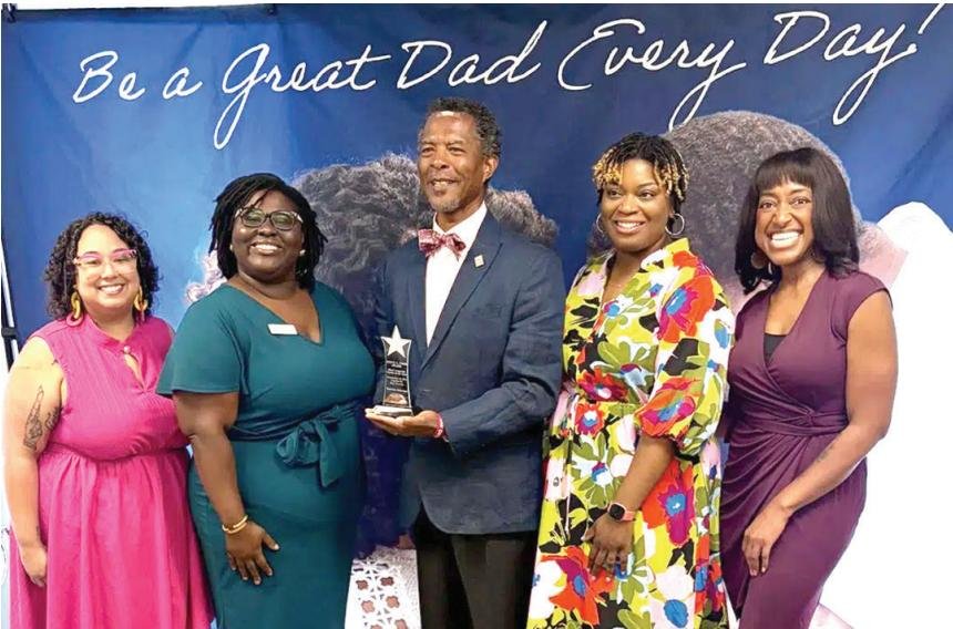 Karriem Edwards (center)