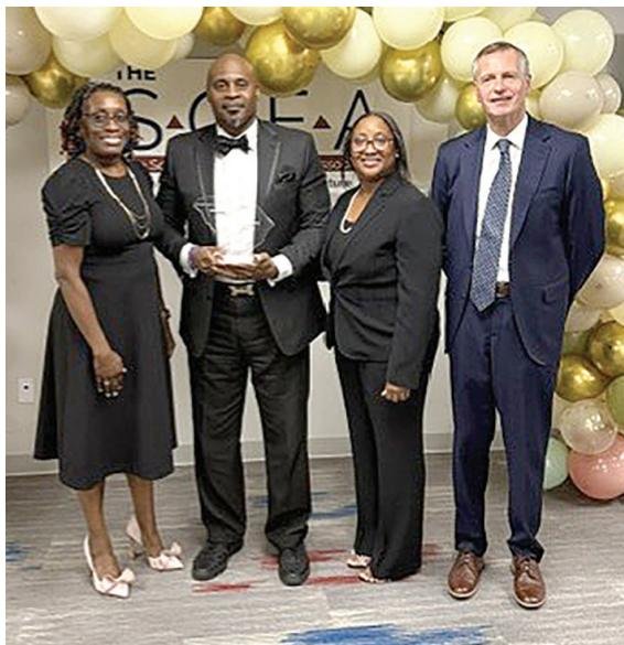 Robert Hemby II (second from left) was honored with the South Carolina Education Association’s Richard W. Riley Award for Community Impact