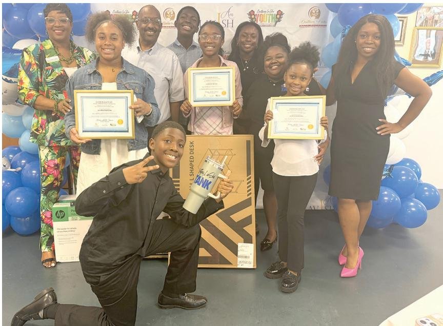 Young entrepreneurs pitch businesses in a Shark Tank-style competition