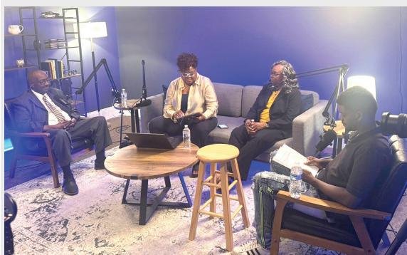 Pictured (left to right): Nathaniel Abraham Jr., Tenita Joi Abraham, Natalie Abraham McKinnie, and Nathaniel Abraham III film the first episode of their new podcast.