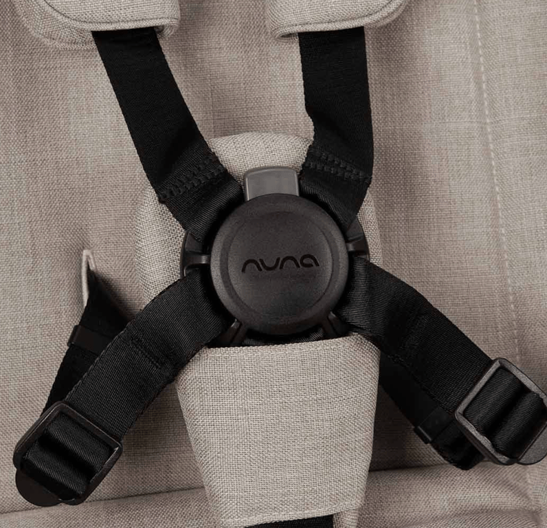 The maddeningly sliding harness height adjustment buckle