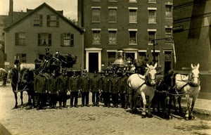 Company members and apparatus of Engine Company 3, on Bristol St., corner of Harrison Av., South End, circa 1911.