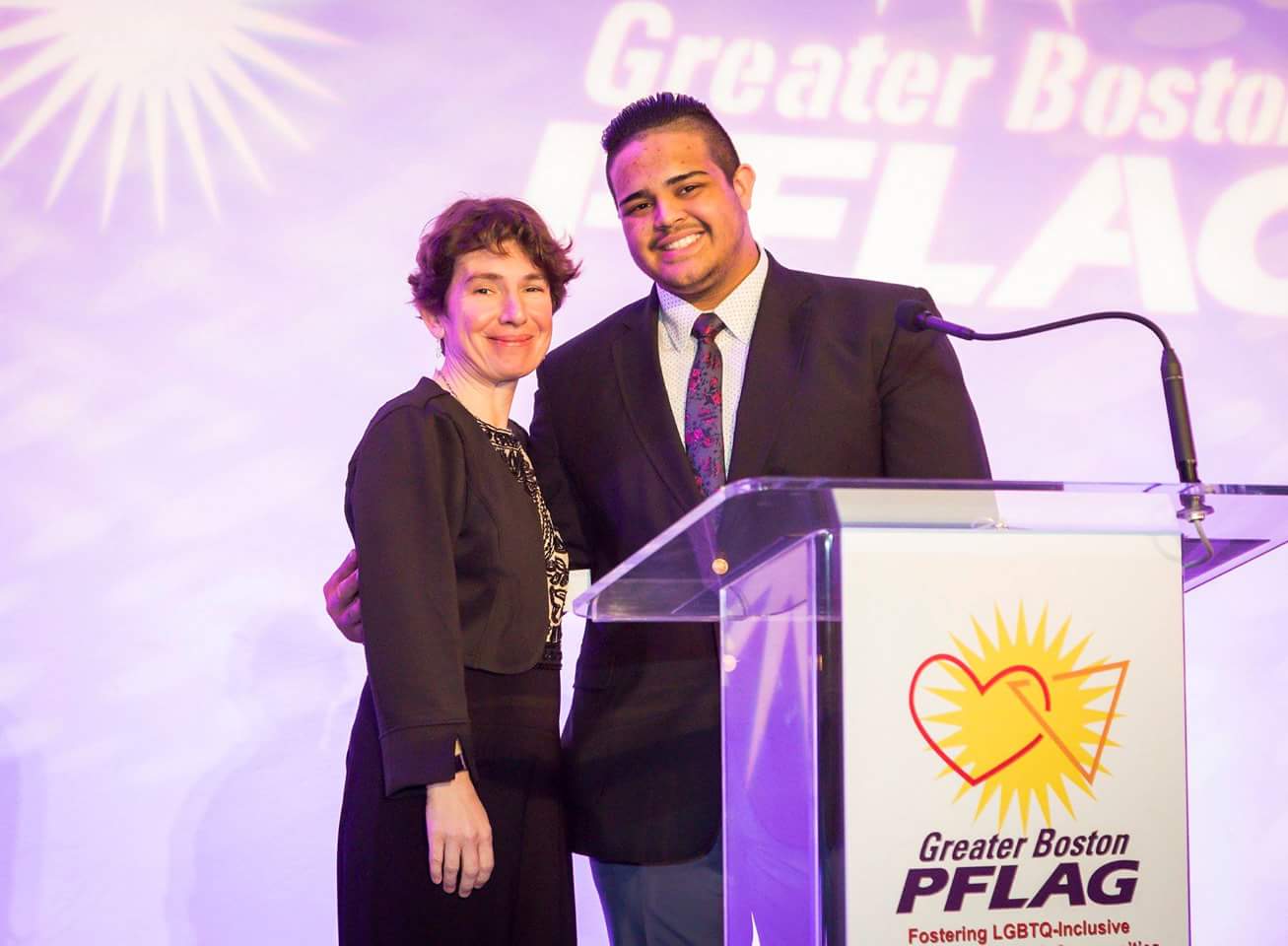 Left to right: Executive Director of Greater Boston PFLAG Valerie Frias and Northeast Metro Tech senior Christian DeJesus Franco at the Greater Boston PFLAG's Pride and Passion dinner. (Courtesy Photo Northeast Metro Tech)