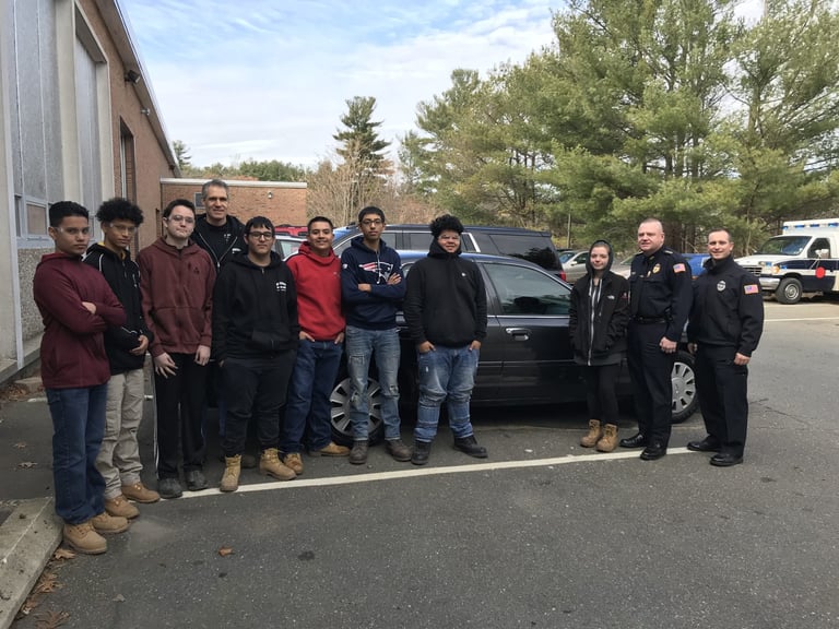 Northeast Metro Tech Students Repair, Repaint Reading Police Car as Part of Community Partnership
