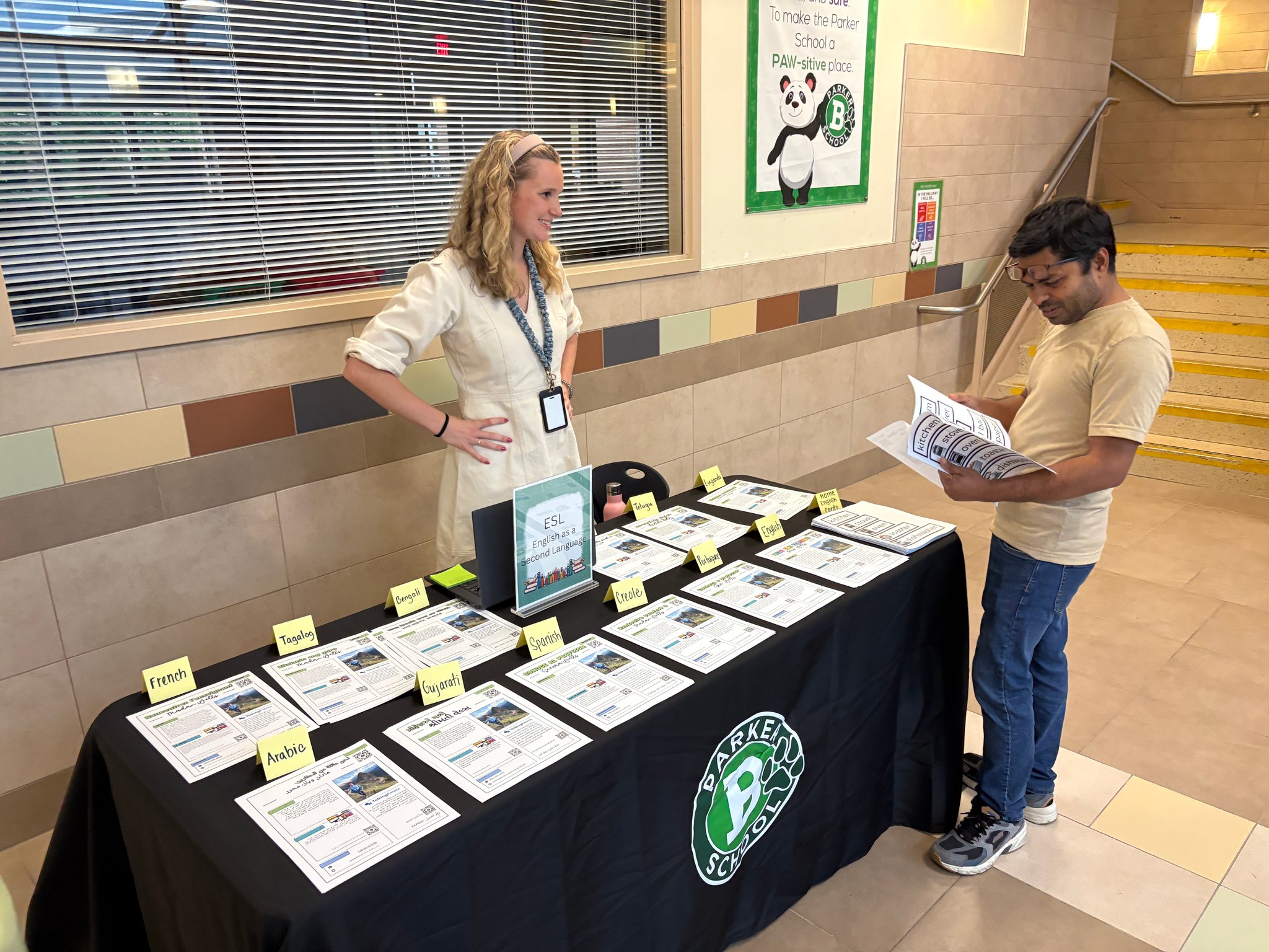 parent with staff at back to school night