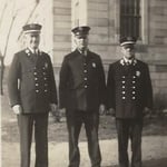 Fire Alarm Operator John M. Ahern on left, with an unknown Asst. Operator and Principal Operator to the right, circa 1930.