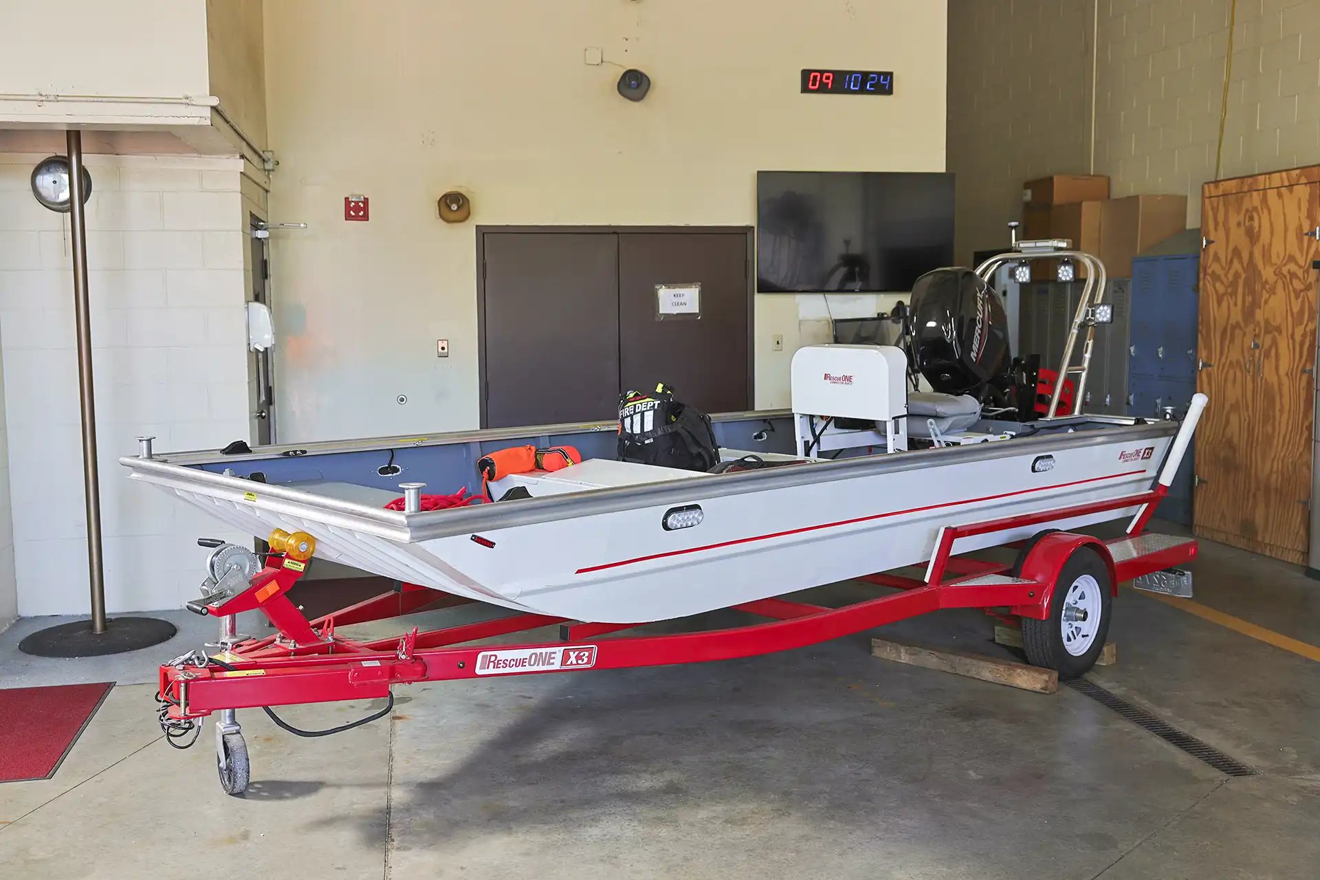 Small gray rescue boat.