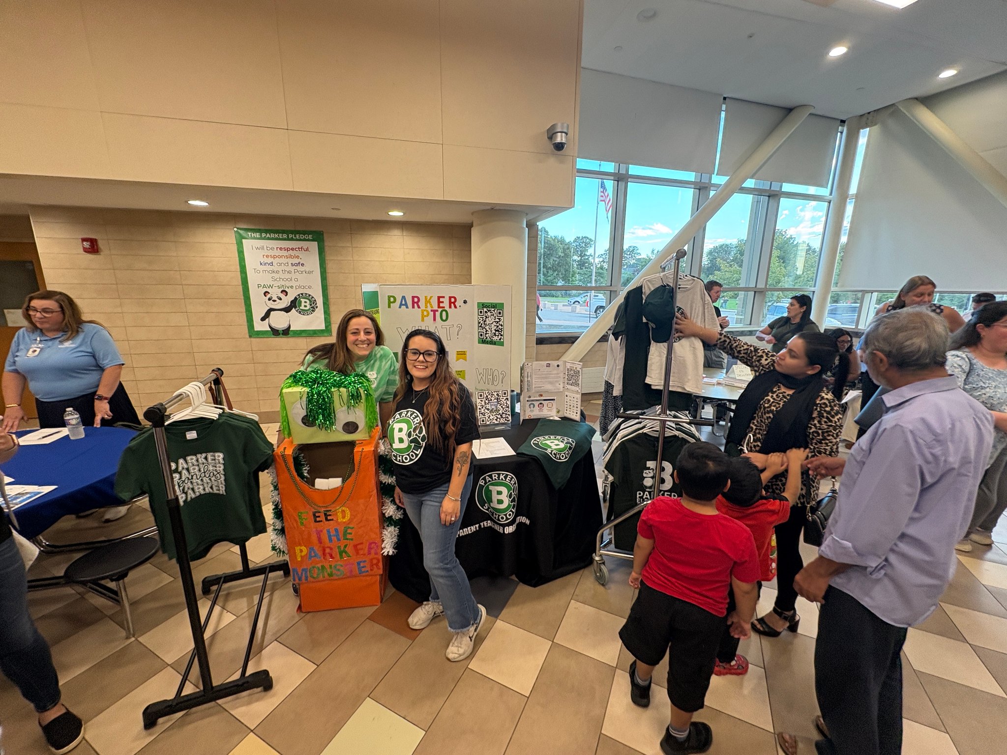 people at tables in cafe for back to school night