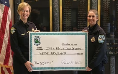 Deputy Superintendent Pauline Wells (Cambridge PD.) $12,000 donation