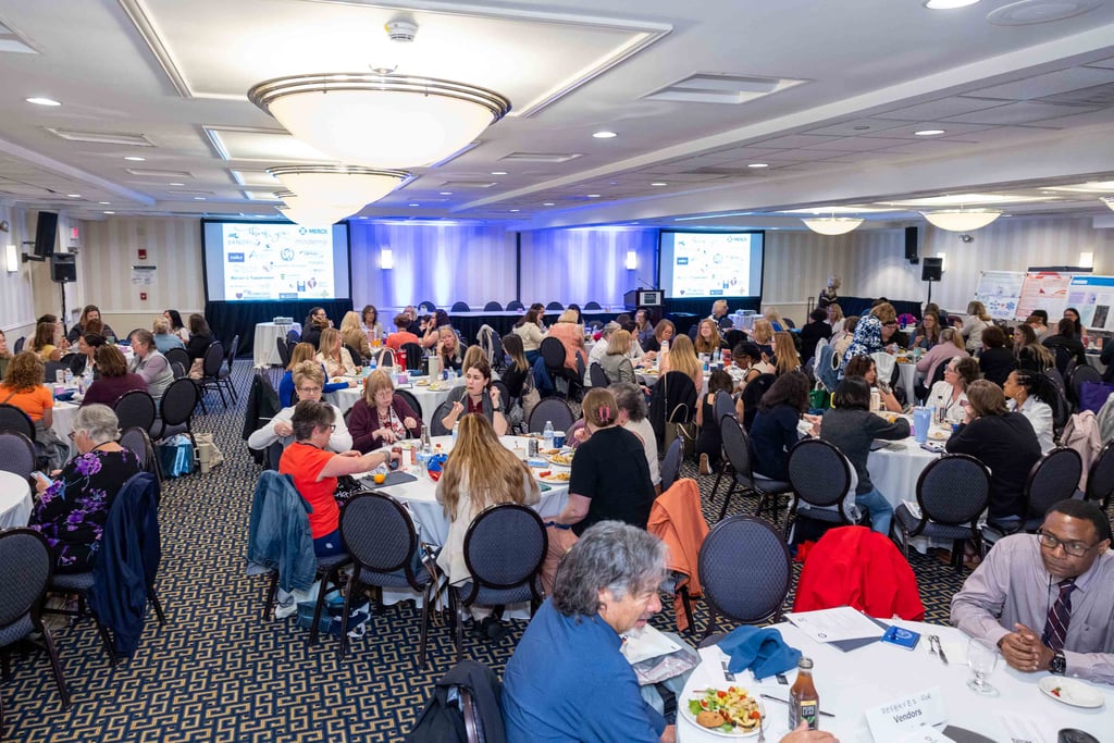 Nurses around tables at the 2025 MAPHN Annual Conference.
