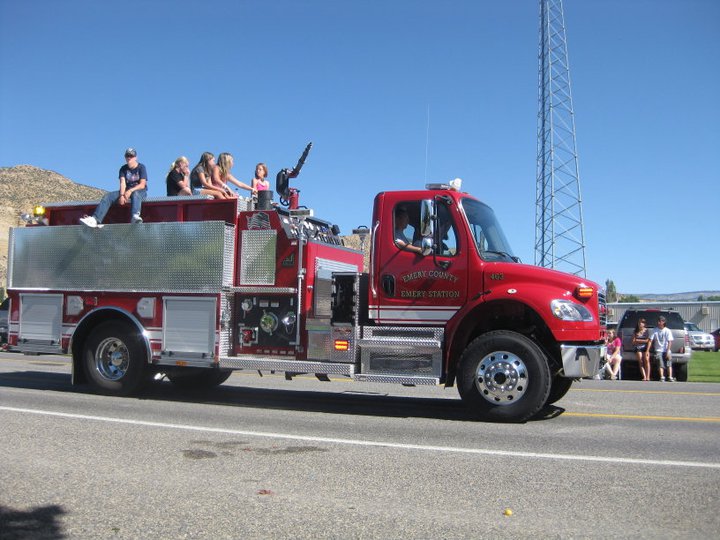 Emery Volunteer Fire Department truck participates in a town parade.