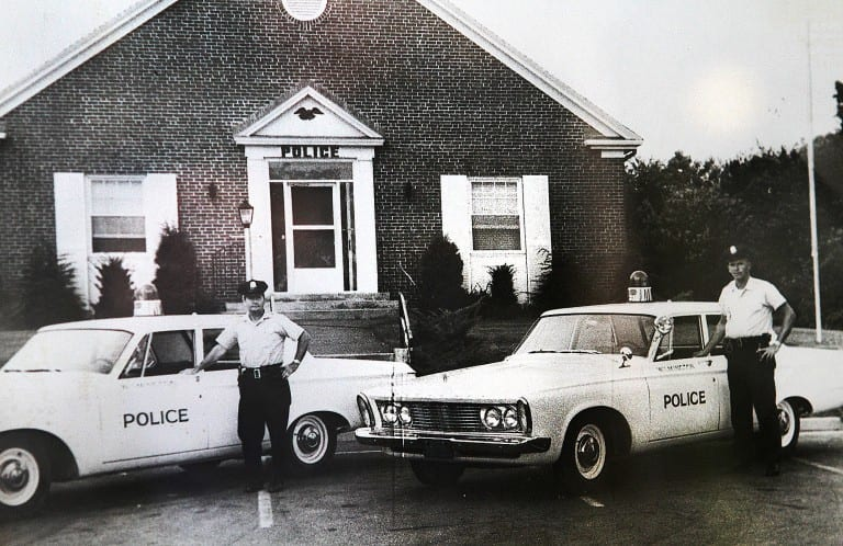 Historical image of police officers in Wilmington, Massachusetts.