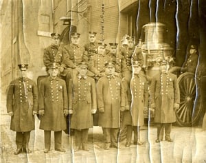 Engine Co. 3 members at quarters at 440 Harrison Av., South End, c. 1911. Hoseman John L. Glynn in center of rear row.