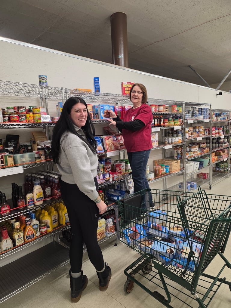 Volunteers stocking shelves