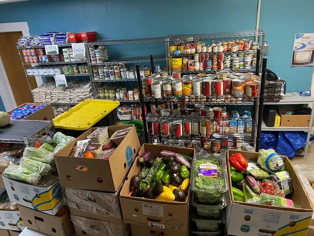 The food panty at the Elizabeth Peabody House stocked with canned and fresh foods.