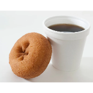 donut with sprinkles, cup of coffee, police hat