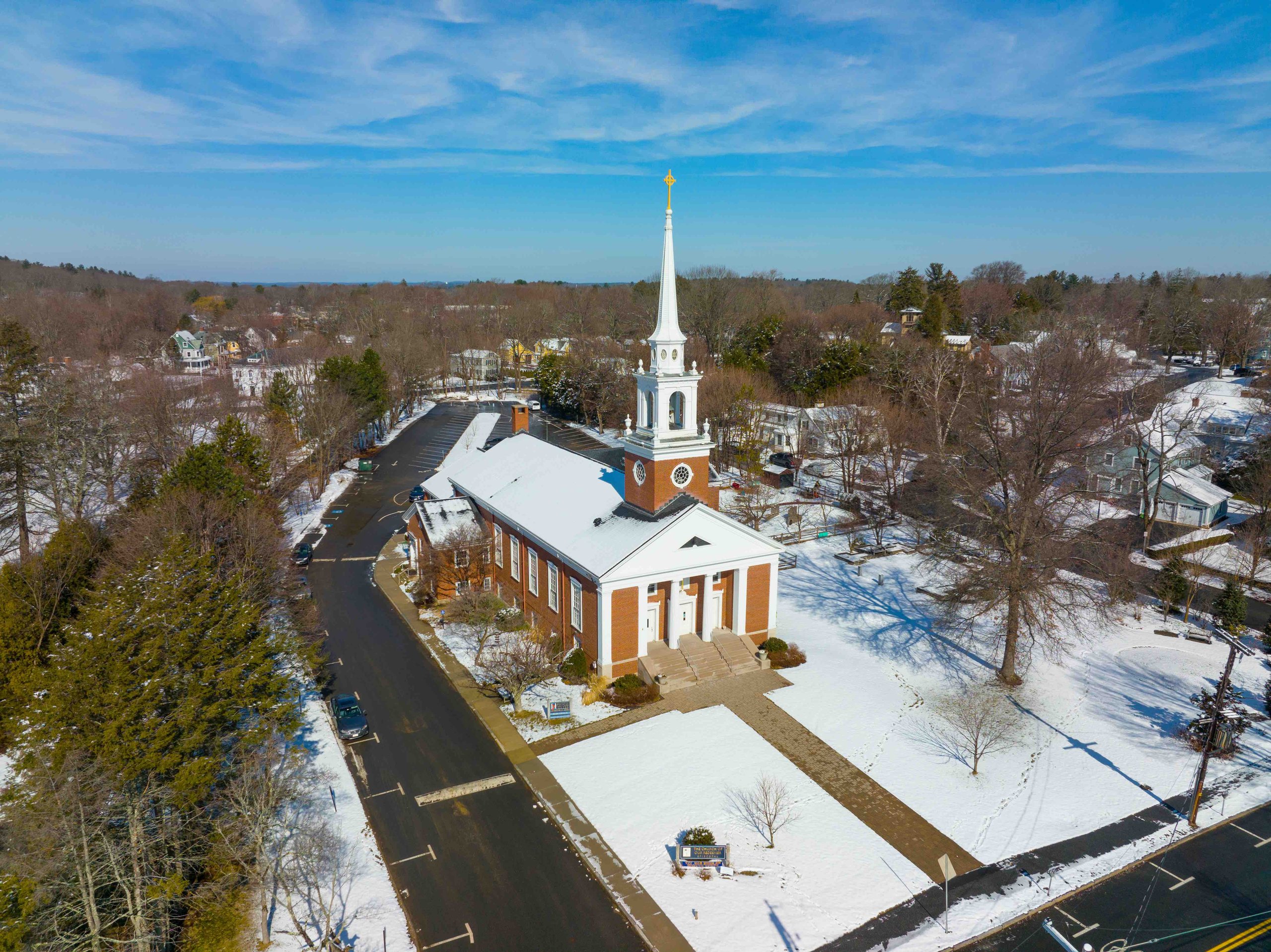 Church of Our Redeemer aerial view in winter at 6 Meriam Street in historic town center of Lexington, Massachusetts MA, USA.