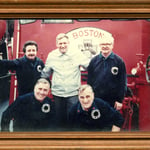 Group photo of Boston Fire Commissioner Leo Stapleton and members of Marine Unit 2, circa 1986.