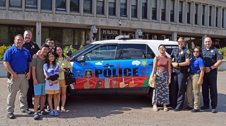 Lowell Police Unveil School Resource Officer Cruiser Designed by Lowell High School Student