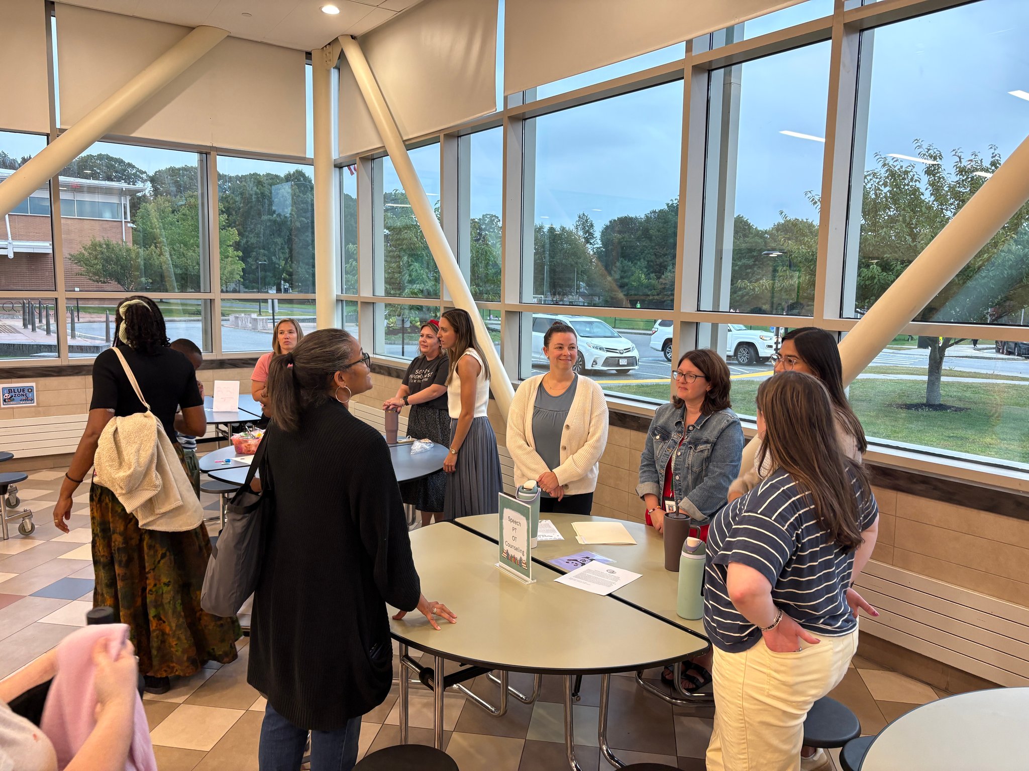 parent with staff at back to school night