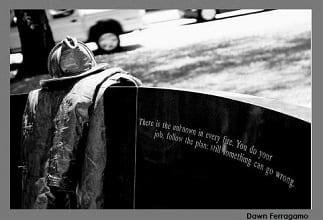 The firefighter's helmet and turnout coat