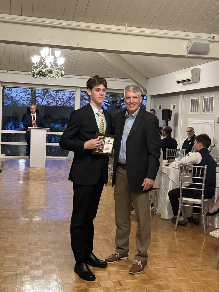 King Philip Regional High School senior Gavin Hickey was joined by King Philip Regional High School Athletic Director Gary Brown as he received the Scholar Athlete Award.