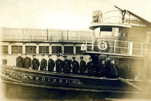 Lieutenant John Williams, 2nd from right, aboard Fireboat 'Thomas A. Ring', Engine 31, circa 1916.