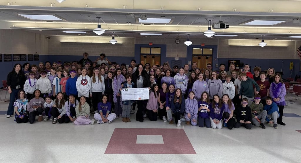Principal Michelle J. Kreuzer is pleased to share that the King Philip Middle School (KPMS) seventh-grade Purple Panther Team recently hosted their second annual KPMS Purple Panther Charity Movie Night.