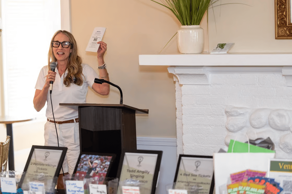 Hundred Club of Massachusetts Executive Director Tracie Hines announced raffle prizes during the banquet.