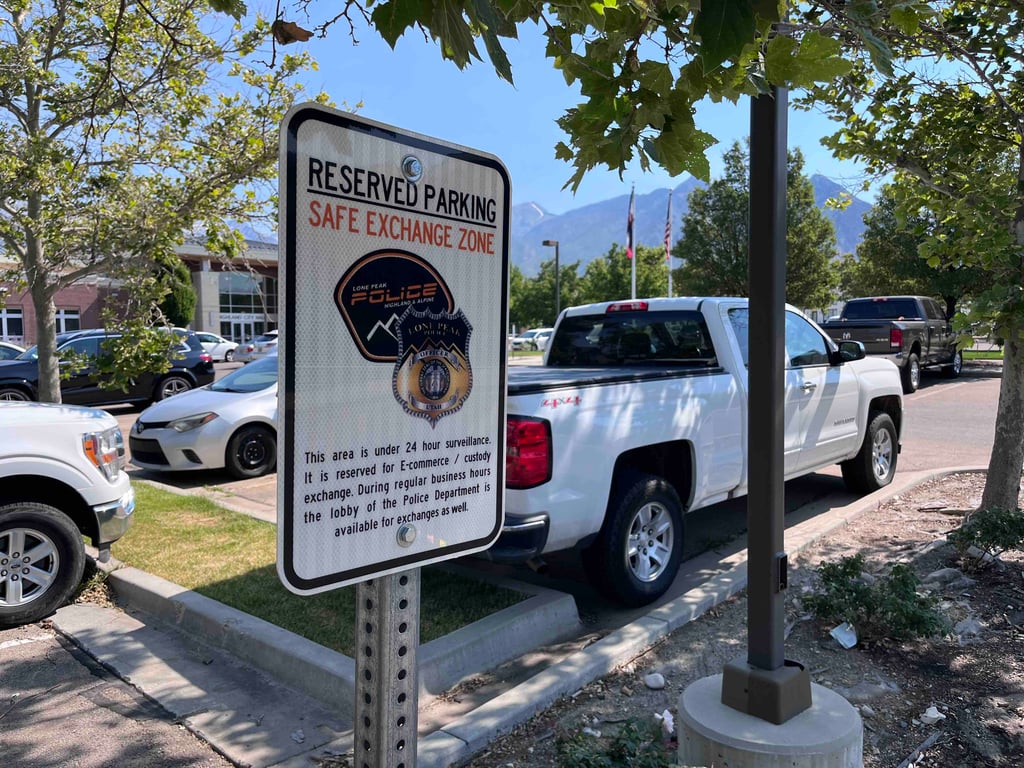 Safe Zone Location marked by a sign in the Lone Peak Police Department Parking Lot.