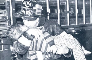 FF (Aide to the District Chief) Thomas Goodwin giving mouth-to-mouth resuscitation, c. 1978.