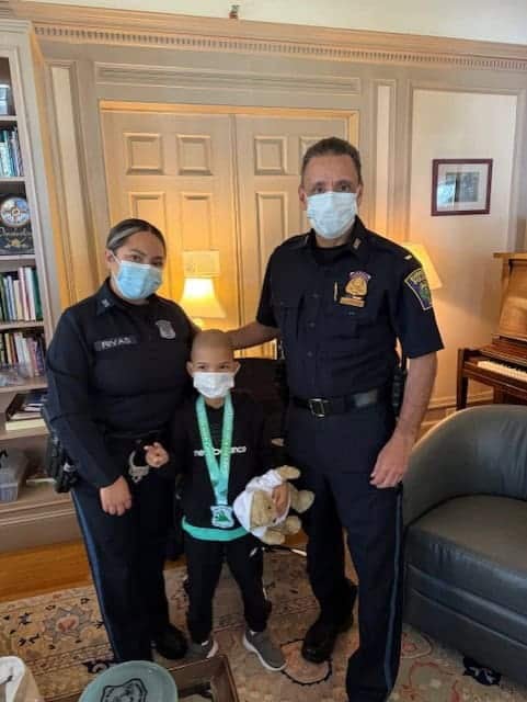 Everett Police Department visited 8 year old Isaac to present them with a $5,500 donation