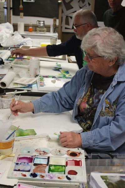 adult students learning watercolor painting