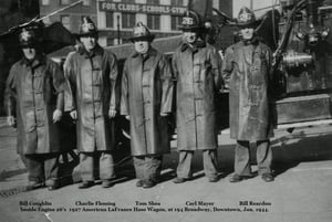 Five members of Engine 26 beside apparatus outside quarters, c. Jan. 1944 @ 194 Broadway, Downtown.
