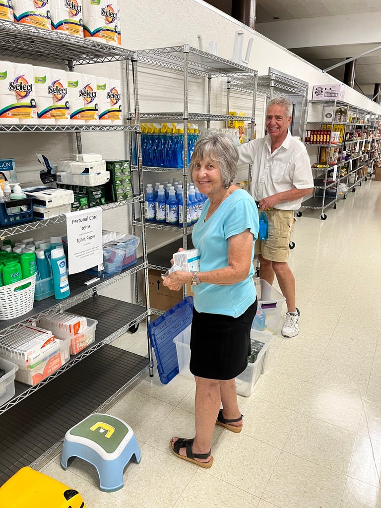 Volunteer stocking shelves
