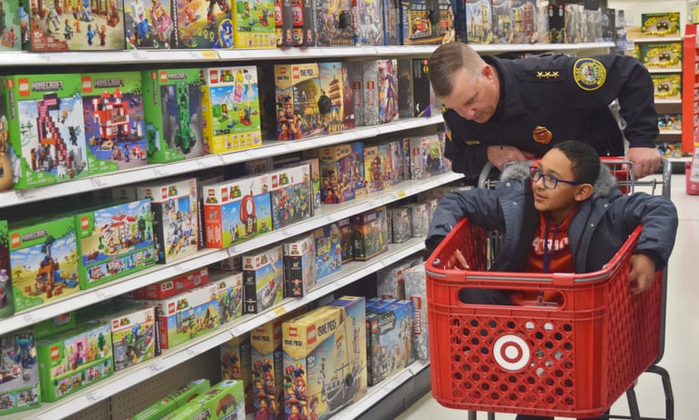 Heroes and Helpers: Lowell Police, Firefighters,  Massachusetts State Police and Pridestar Trinity EMTs Go Holiday Shopping with Lowell Youth